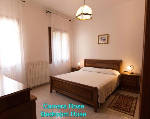 Postel nebo postele na pokoji v ubytování Corte dei Sisanda1