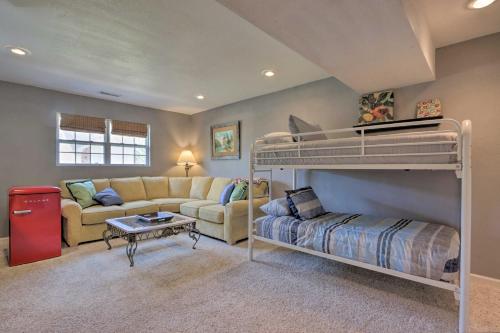 a living room with a bunk bed and a couch at Less Than 1 Mi to Marina Family-Friendly Osage Beach Home in Osage Beach