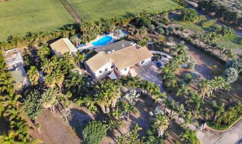 an aerial view of a house with a pool at villa Bismarkia in Syracuse