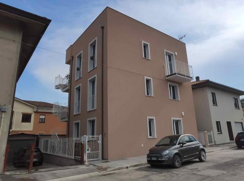 a car parked in front of a building at DolceVita Home in Civitanova Marche