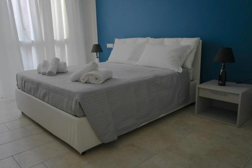 Posteľ alebo postele v izbe v ubytovaní DubaiBeachotel