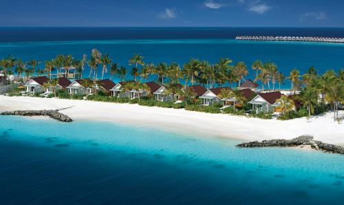 an aerial view of a beach with houses at OBLU SELECT Lobigili - Premium All-Inclusive with Free Transfers in Male City