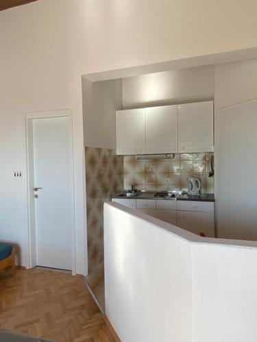 Kuchyň nebo kuchyňský kout v ubytování Studio apartman More