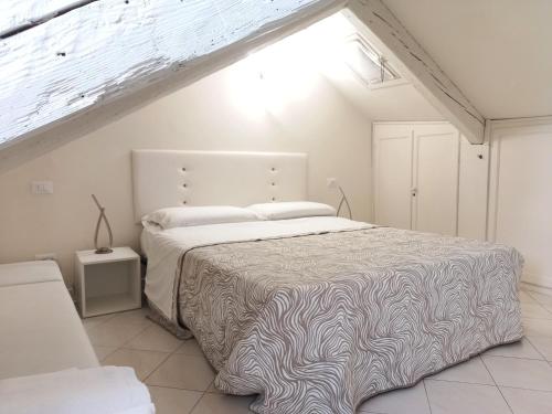 Кровать или кровати в номере Casanova Apartment San Marco