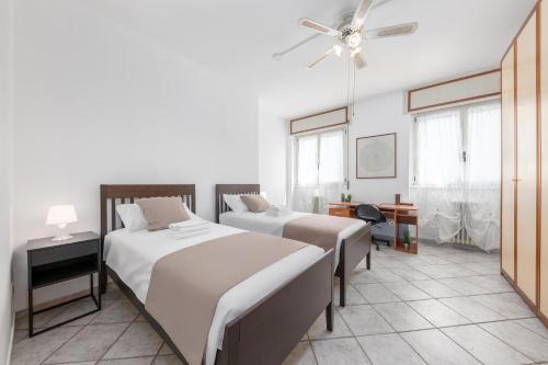 Posteľ alebo postele v izbe v ubytovaní Casa da Suite Evenka