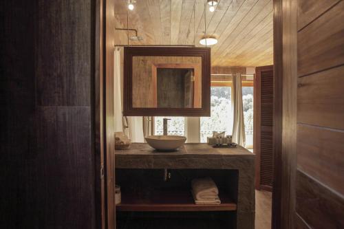 a bathroom with a sink and a bowl on a counter at Casafranca in Ollantaytambo