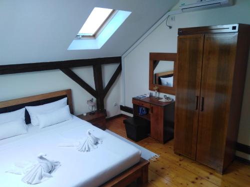 Кровать или кровати в номере Devedzic