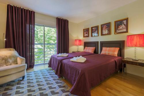 Postel nebo postele na pokoji v ubytování Cidadela - Luxury Apt with Pool