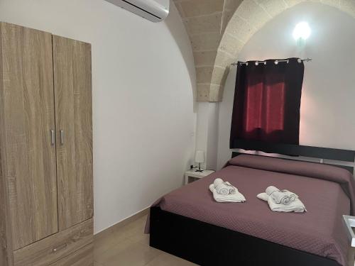 Кровать или кровати в номере CHIC casa vacanze