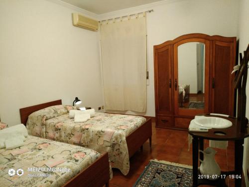 A bed or beds in a room at APPARTAMENTO VISTAMARE