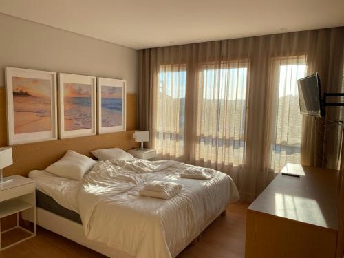 Кровать или кровати в номере Altamira NB