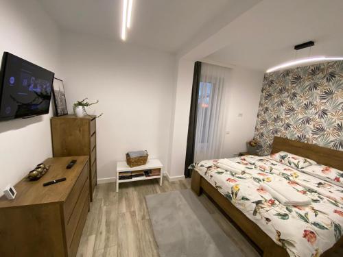 Llit o llits en una habitació de Lora Studio