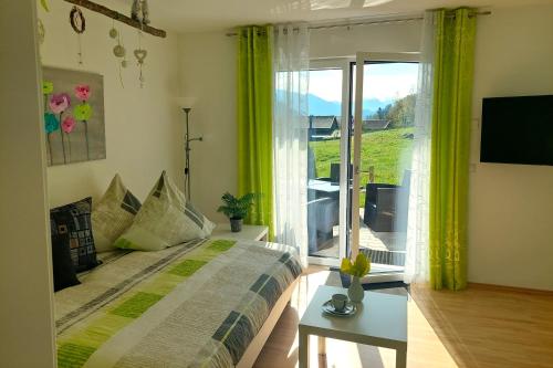 Un pat sau paturi într-o cameră la Ferienwohnungen Apart Diana