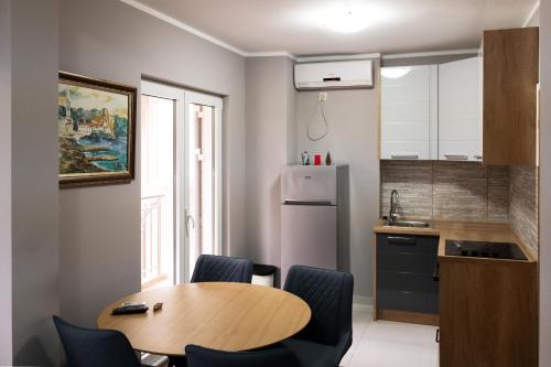 Kuchyň nebo kuchyňský kout v ubytování Guest House Mrvaljević