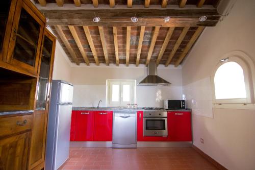 Η κουζίνα ή μικρή κουζίνα στο Holiday Home Il Borgo Degli Agrumi