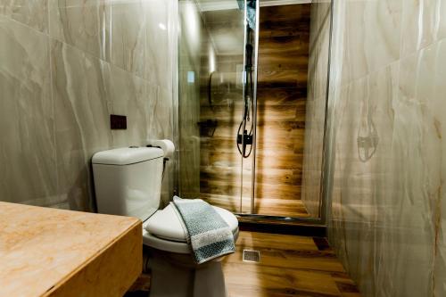 Ένα μπάνιο στο Tramonto Maisonettes & Suites