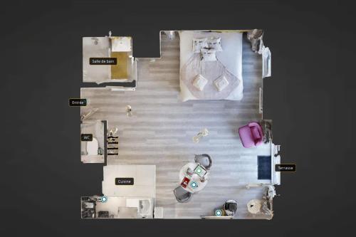 - une vue de tête sur une chambre d'hôtel dans l'établissement Romantique 