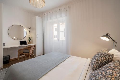 Ένα ή περισσότερα κρεβάτια σε δωμάτιο στο Casa Caetano by An Island Apart