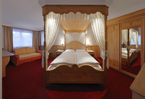 Postel nebo postele na pokoji v ubytování Hotel Ingram