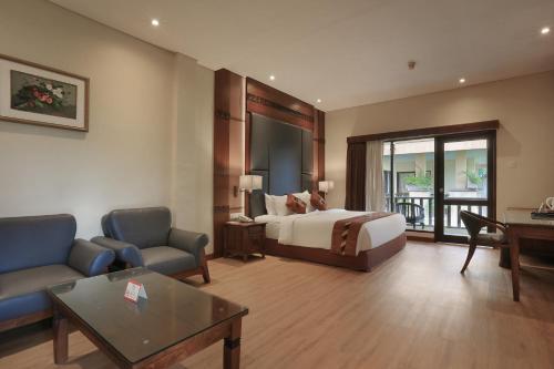 A seating area at Pelangi Bali Hotel & Spa
