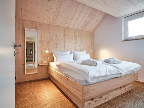 Postel nebo postele na pokoji v ubytování Ferienhäuser Fischer Wagenhausen