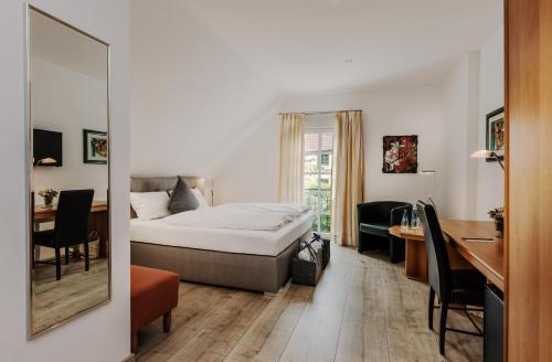 Posteľ alebo postele v izbe v ubytovaní Romantik Hotel Neuhaus