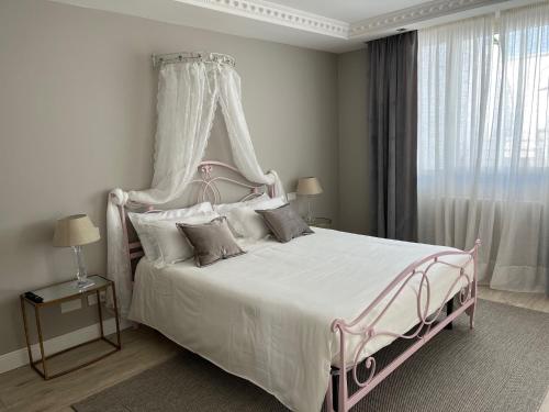 Posteľ alebo postele v izbe v ubytovaní B&B Da Patty