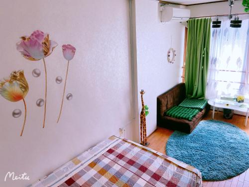 Katil atau katil-katil dalam bilik di Yoshidoku Inn Domemae 1 - Close to USJ World Expo Airport吉徳家庭旅館1ドーム前近万博USJ空庭菓匠温泉大阪城公园难波心斋桥関西空港直达免费寄存旅行箱