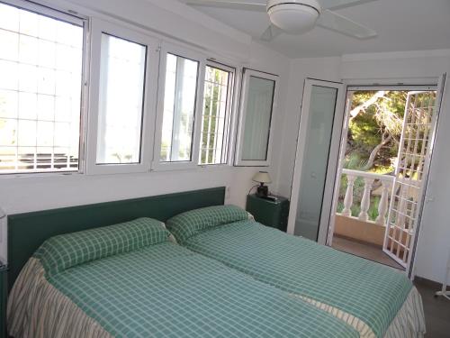 Postel nebo postele na pokoji v ubytování Villa Zenia Beach
