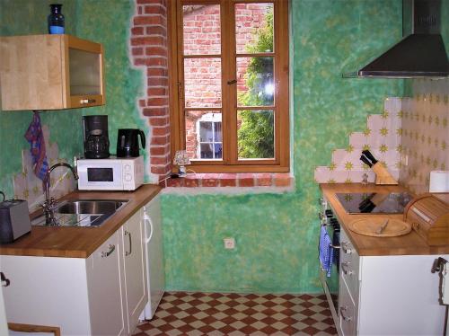 Dapur atau dapur kecil di Fischerhaus Godewind 45 qm Studio