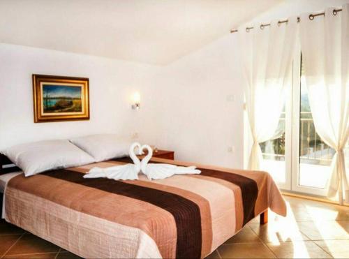 Posteľ alebo postele v izbe v ubytovaní Villa Fabry