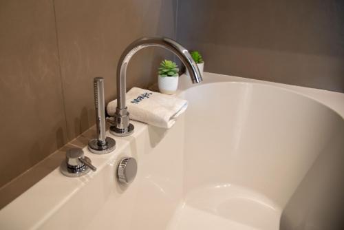 Ванная комната в Maya's Flats & Resorts 46 - NEW PANORAMA VIEW Walowa Str