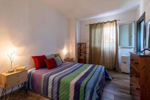 Кровать или кровати в номере Casa di Noi