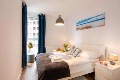 Posteľ alebo postele v izbe v ubytovaní Maya's Flats & Resorts 51 - Aura 40