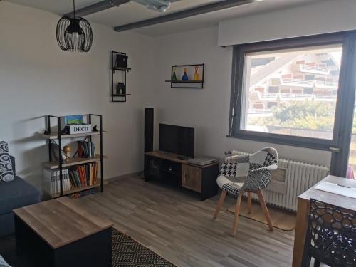 TV a/nebo společenská místnost v ubytování Appartement Torgon