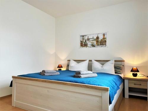 Llit o llits en una habitació de Silberseehaus in der Freizeitoase Mortka