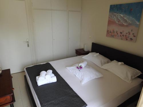 Postel nebo postele na pokoji v ubytování Konstantinos Luxury Beach House