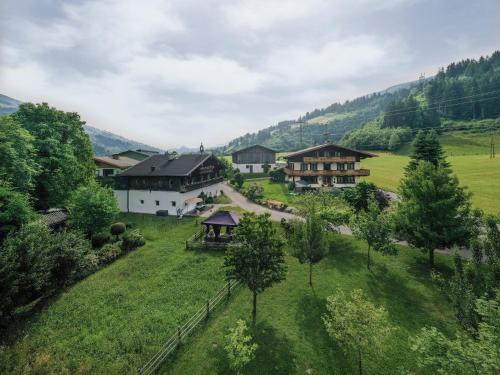 an aerial view of a village with houses and trees at Ferienwohnung 2 in Taxenbach