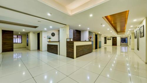 Μια τηλεόραση ή/και κέντρο ψυχαγωγίας στο Hotel Galaxy Inn Kolhapur