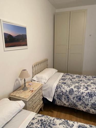 Postel nebo postele na pokoji v ubytování Hostal Casiano Camarasa