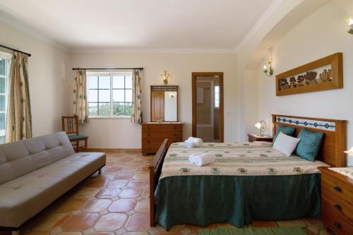 Ένα ή περισσότερα κρεβάτια σε δωμάτιο στο Casa dos Avós