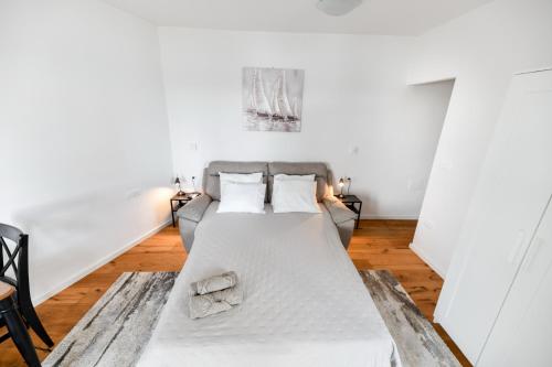 Posteľ alebo postele v izbe v ubytovaní Apartment Canada