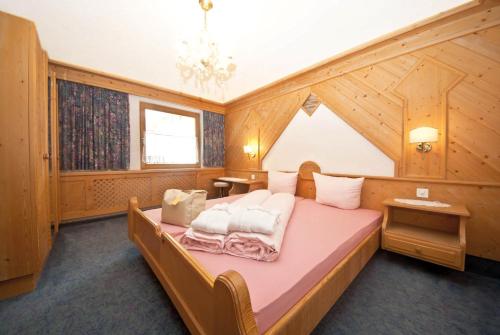 Cama o camas de una habitación en Hotel des Alpes