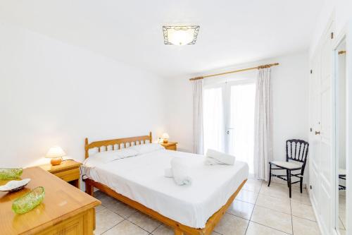 Postel nebo postele na pokoji v ubytování Villa Rosa