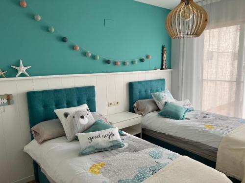 Кровать или кровати в номере Apartament Montsià