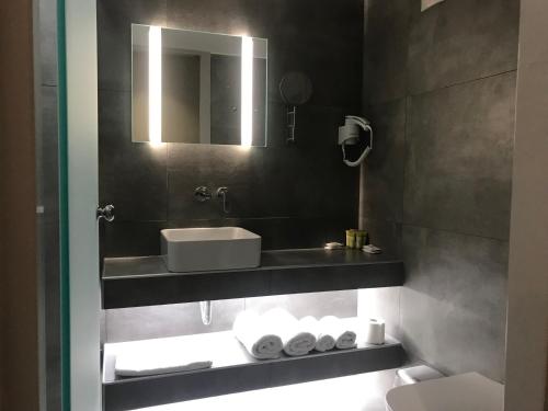 Koupelna v ubytování Plaza Hotel