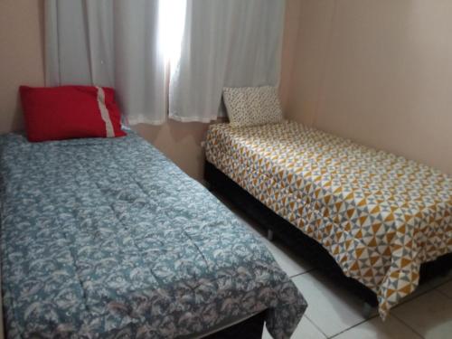 Cama o camas de una habitación en el kit Girassol