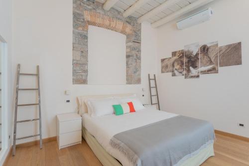 Posteľ alebo postele v izbe v ubytovaní Wine Not Apartment in Como City Centre