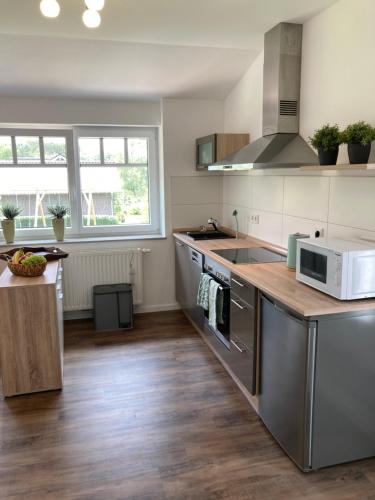 Кухня или мини-кухня в Ferienwohnung Birkenhof - Urlaub auf dem Bauernhof mit Blick ins Grüne
