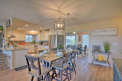 a kitchen and dining room with a table and chairs at 5 Mi to Dtwn Prescott Home with Deck and Mtn Views in Prescott